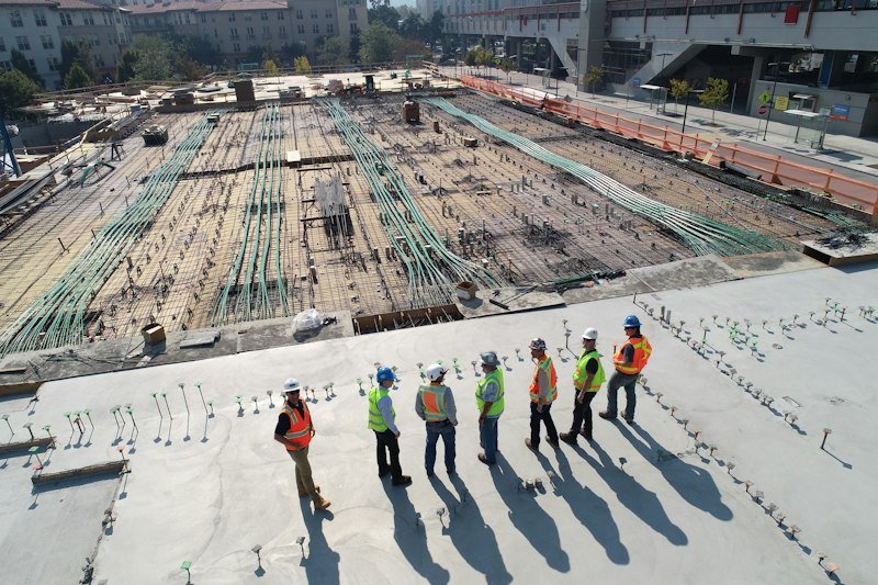 Construction site with cranes and workers
